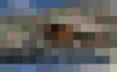 Schneebedecktes Haus Vera in Zell am See, umgeben von winterlicher Berglandschaft.